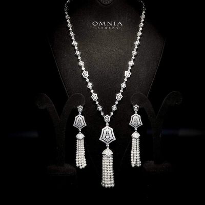 Omnia Lulu White Set in 92.5 Silver with High Quality Simulated Diamonds and Pearl Tassel Detailing