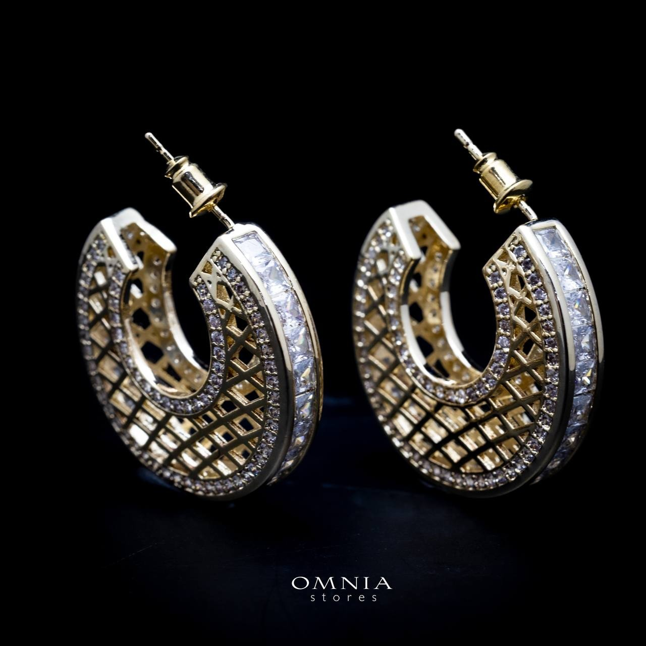 Omnia Joud Golden Earrings in High Quality Zircon Stone Rhodium Plated image number null