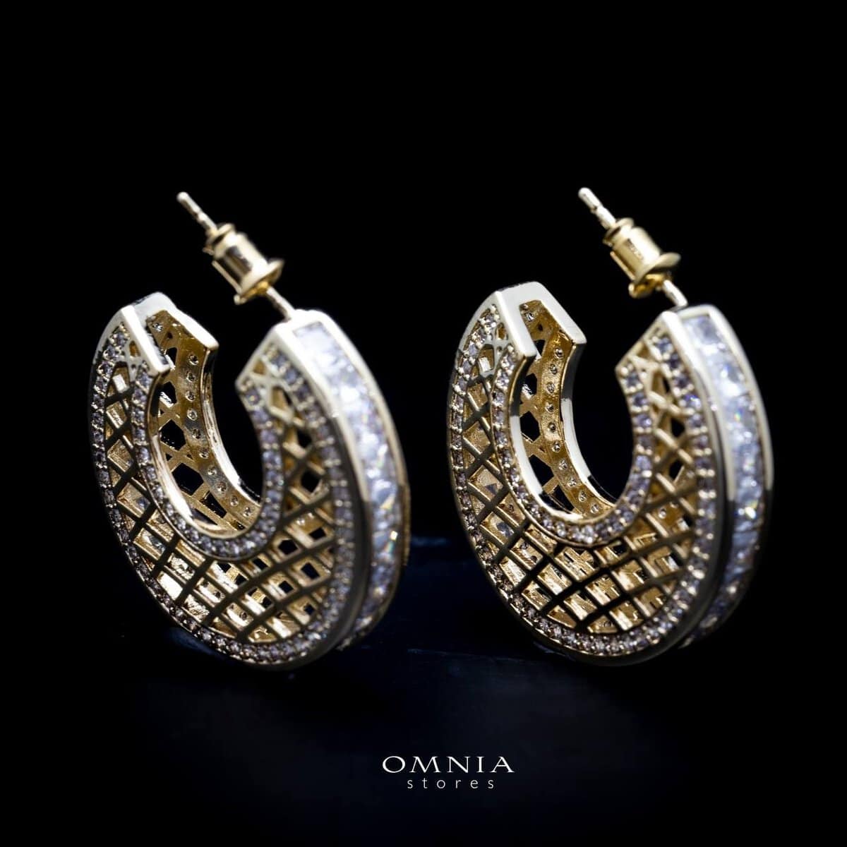 Omnia Joud Golden Earrings in High Quality Zircon Stone Rhodium Plated image number null