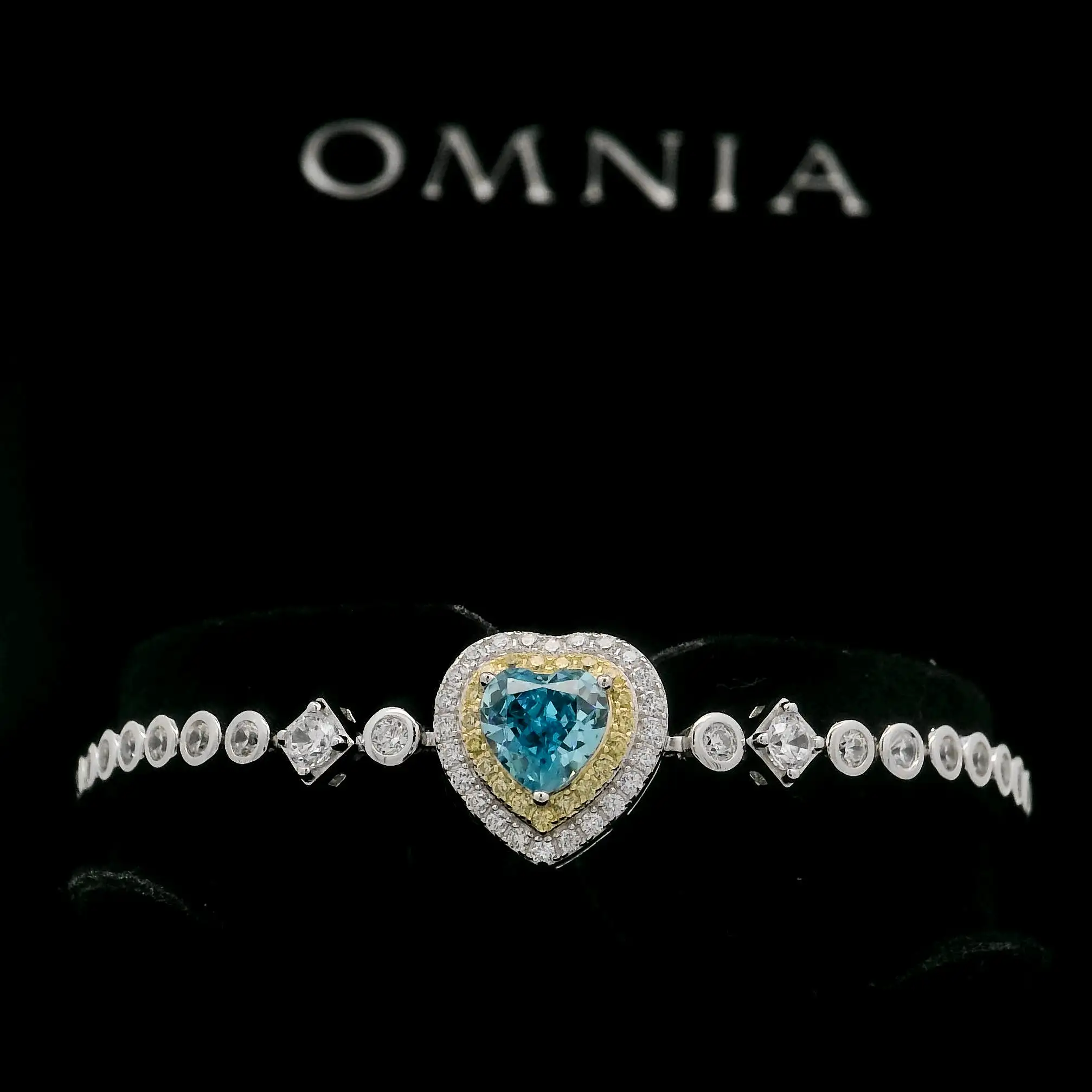 Omnia Almas Blue Heart Radiance Tennis Bracelet in 92.5 Silver with High Quality Simulated Diamonds image number null