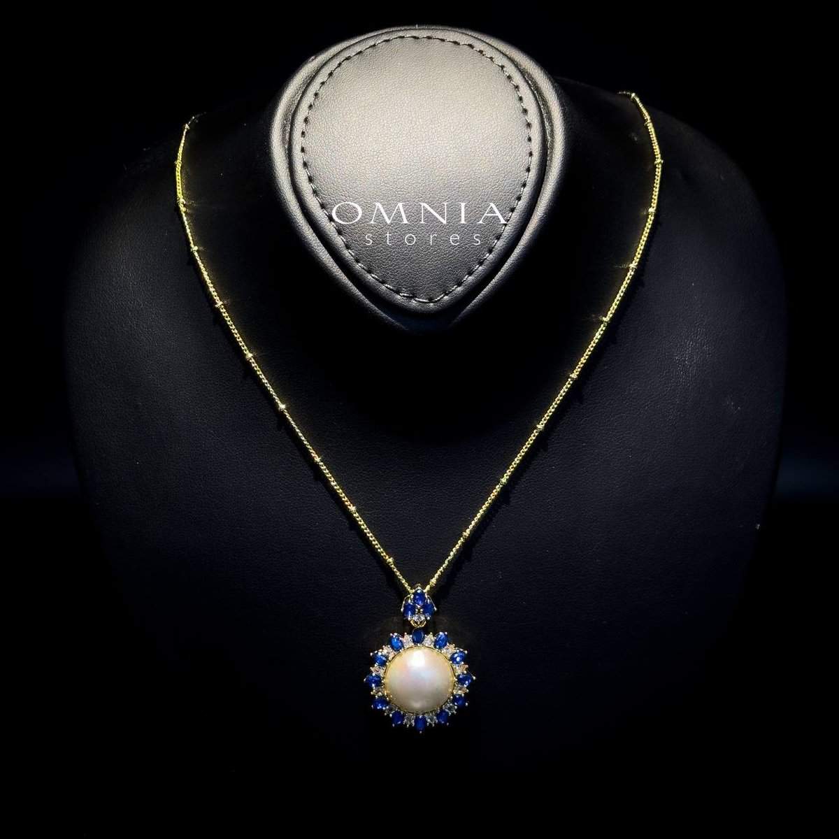 Omnia Celeste White Mabel Pearl Halo Pendant Necklace with Blue Sapphire Accents in Brass with Gold Plated Finish image number null