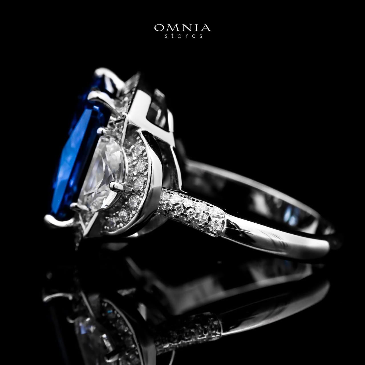 Omnia Sadeen Emerald Cut Sapphire Blue Ring in 92.5 Silver with High Quality Simulated Diamonds image number null
