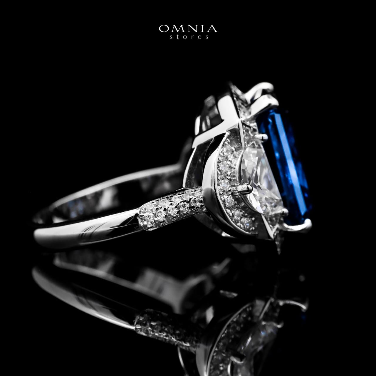 Omnia Sadeen Emerald Cut Sapphire Blue Ring in 92.5 Silver with High Quality Simulated Diamonds image number null