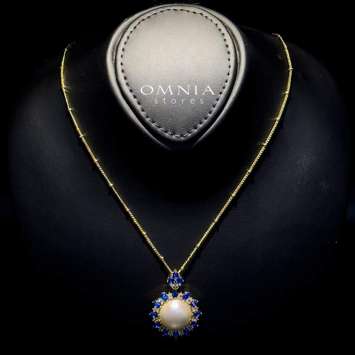 Omnia Celeste White Mabel Pearl Halo Pendant Necklace with Blue Sapphire Accents in Brass with Gold Plated Finish image number null